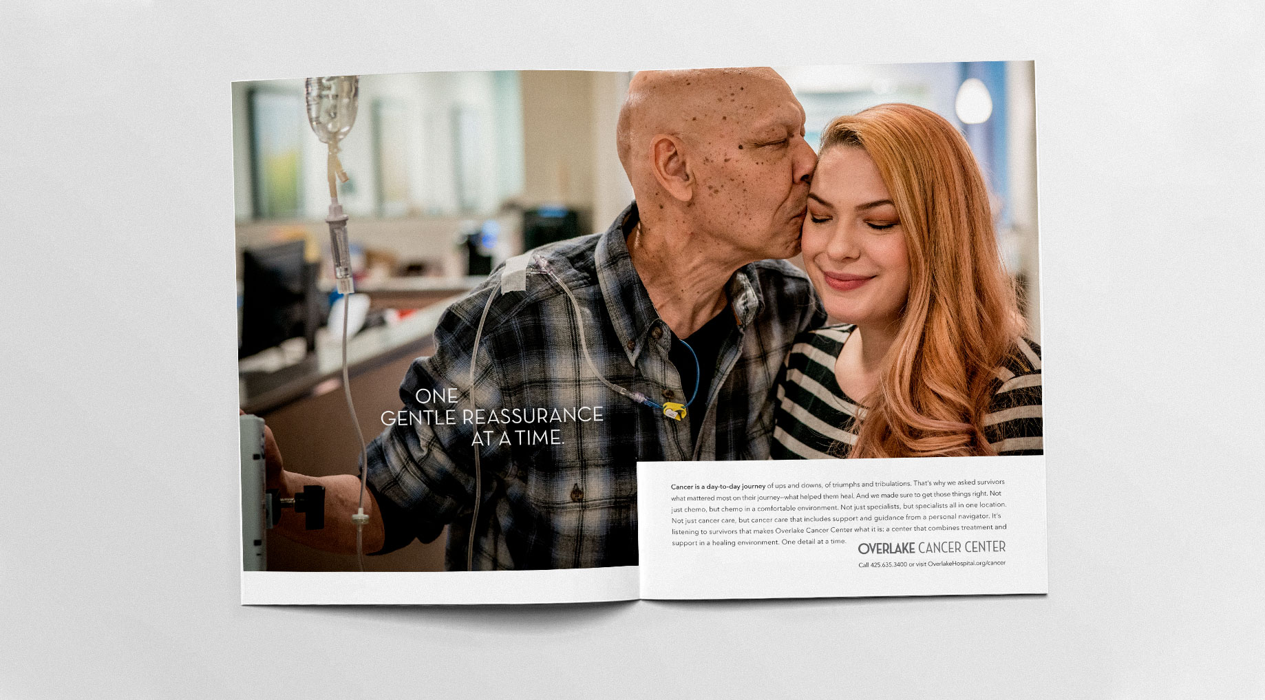 A man with a medical IV kisses a smiling woman on the forehead in a hospital setting, showcasing a moment of affection and support during a health challenge.