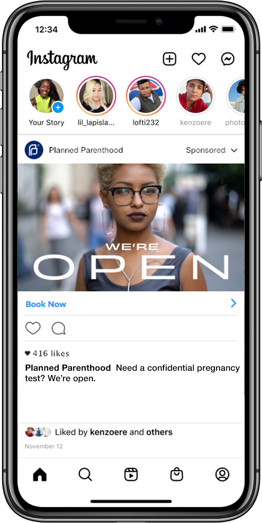 Image of a mobile phone displaying a Planned Parenthood advertisement featuring a woman with short hair and glasses, promoting confidential pregnancy testing with the message "WE'RE OPEN" prominently displayed. The ad encourages viewers to book an appointment for services.