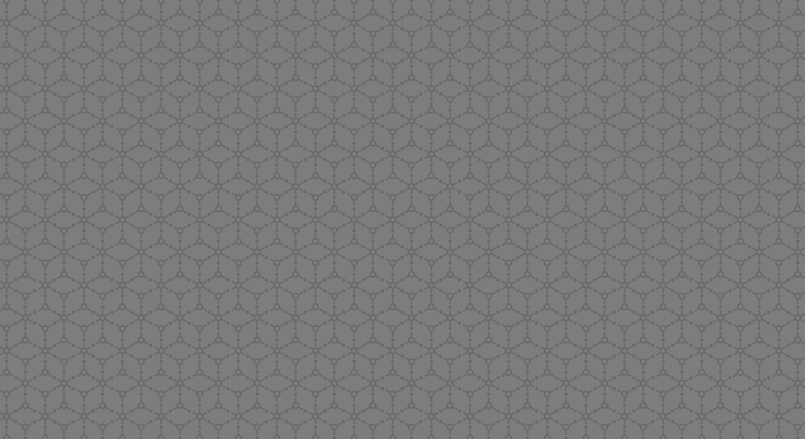 Gray hexagonal pattern background, featuring a subtle geometric design ideal for use in modern web and graphic design projects.