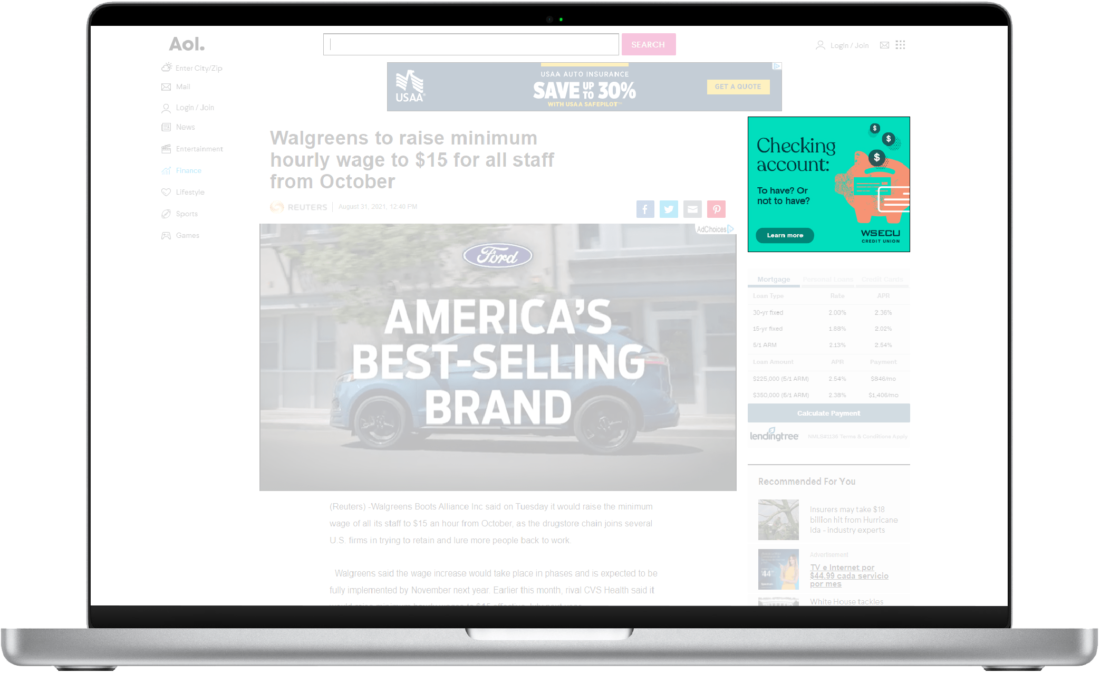 Laptop displaying an online article about Walgreens raising its minimum hourly wage to $18 for all staff starting in October, with a sidebar advertisement.