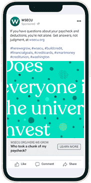 Text on a smartphone screen displaying a colorful background with the question "Does everyone in the universe invest?" along with hashtags related to finance and credit.