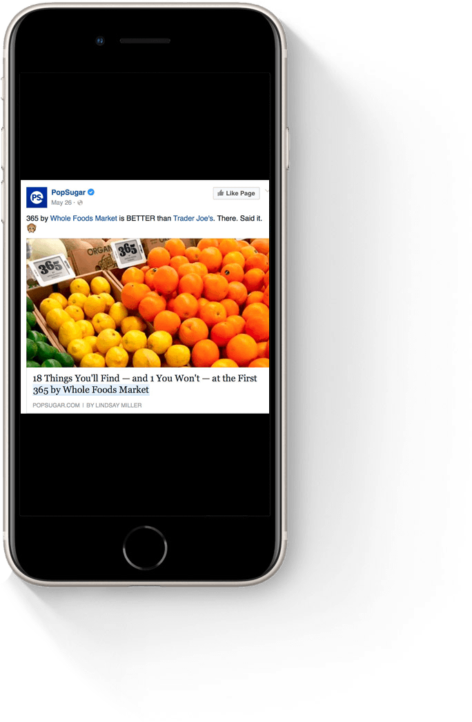 Image of a smartphone displaying a social media post featuring a colorful assortment of oranges and other fresh fruits, highlighting a promotion for a local produce market.
