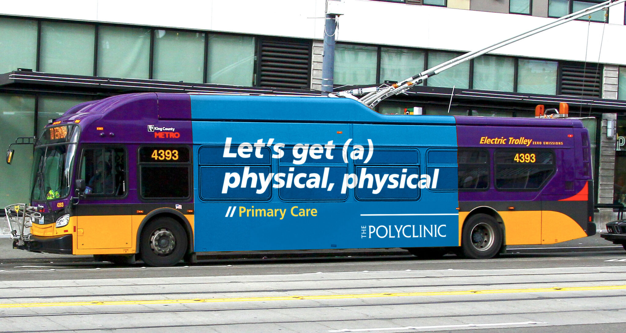 Bus advertisement for a primary care clinic featuring the slogan "Let's get (a) physical, physical" promoting health services.