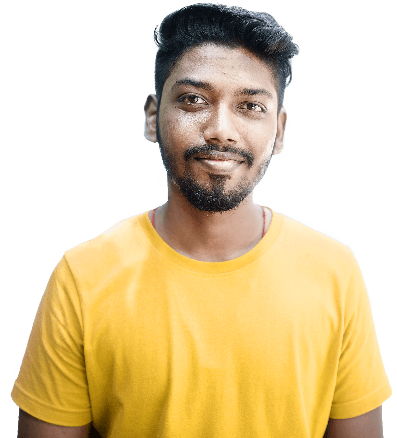 Smiling young man wearing a yellow t-shirt, standing against a white background.