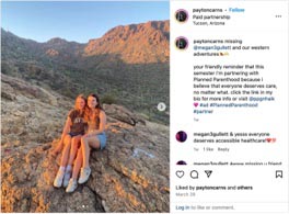Two women sitting on a rock formation with mountains in the background during sunset, enjoying a moment together in nature.