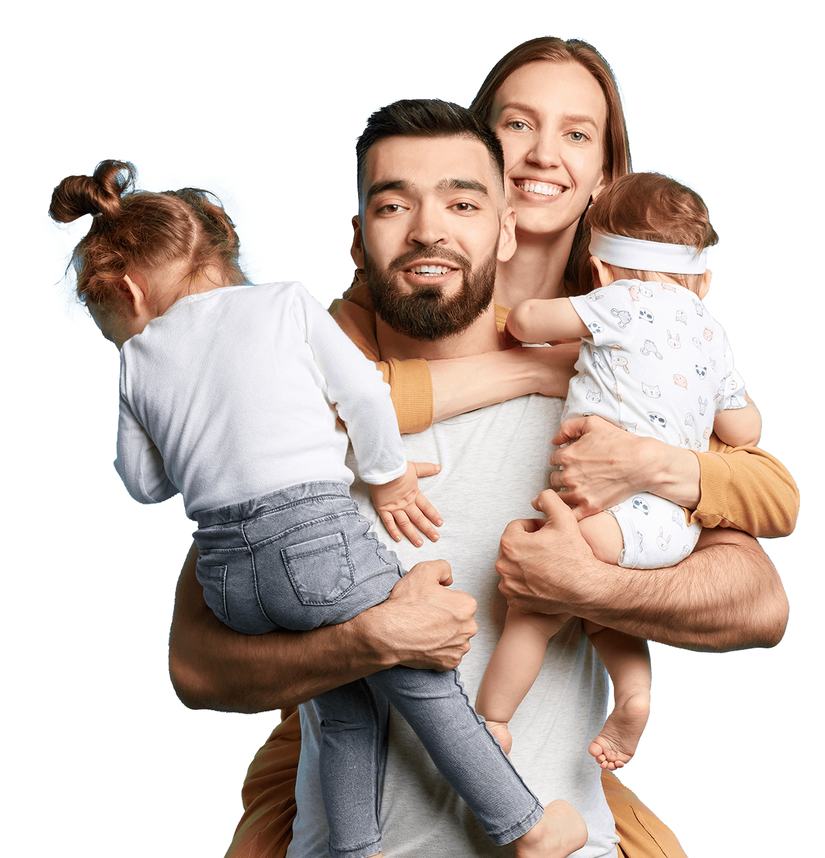 Happy family portrait featuring a father holding two young children, while the mother smiles beside them. The scene conveys love and togetherness, highlighting the joys of parenthood.